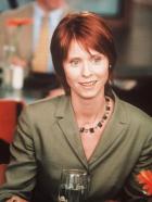 Sex and the City - Miranda (Cynthia Nixon) wird von ihrem Zahnarzt verdonnert, ein Jahr lang eine feste Zahnspange zu tragen. Da dies nicht nur lästig, sondern auch ästhetisch unbefriedigend wäre, fragt sie voher ihre Freundinnen um Rat. © Paramount Pictures